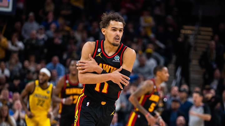 Jan 13, 2023; Indianapolis, Indiana, USA; Atlanta Hawks guard Trae Young (11) celebrates a basket in the second half against the Indiana Pacers at Gainbridge Fieldhouse. Mandatory Credit: Trevor Ruszkowski-Imagn Images