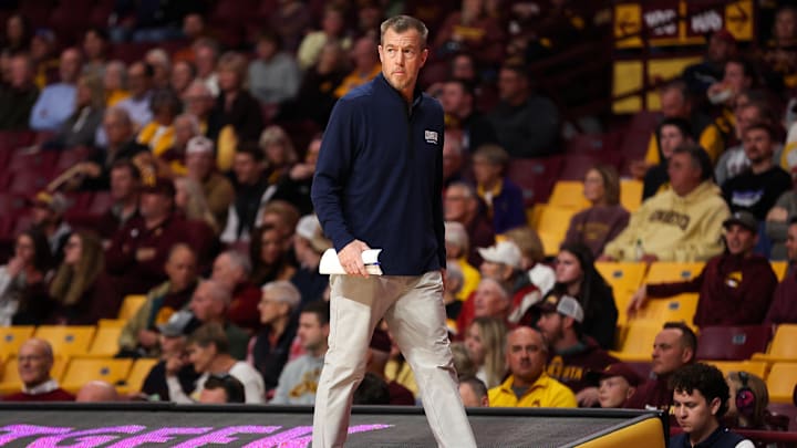 Nov 6, 2024; Minneapolis, Minnesota, USA; Oral Roberts Golden Eagles head coach Russell Springmann looks on during the first half against the Minnesota Golden Gophers at Williams Arena. Mandatory Credit: Matt Krohn-Imagn Images Nov 6, 2024; Minneapolis, Minnesota, USA; Oral Roberts Golden Eagles head coach Russell Springmann looks on during the first half against the Minnesota Golden Gophers at Williams Arena. Mandatory Credit: Matt Krohn-Imagn Images
