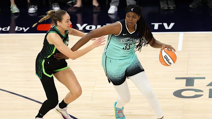 Oct 16, 2024; Minneapolis, Minnesota, USA; New York Liberty forward Jonquel Jones (35) works around Minnesota Lynx forward Alanna Smith (8) during the first half of game three of the 2024 WNBA Finals at Target Center. Mandatory Credit: Matt Krohn-Imagn Images