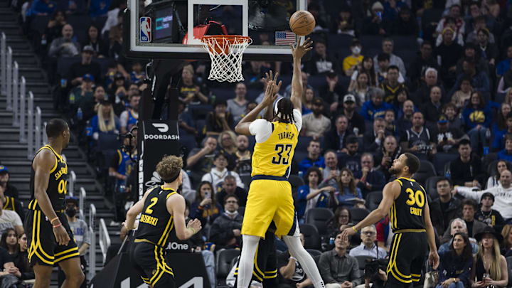 Mar 22, 2024; San Francisco, California, USA; Indiana Pacers center Myles Turner (33) shoots as Golden State Warriors guard Stephen Curry (30) and others watch during the first half at Chase Center. Mandatory Credit: John Hefti-Imagn Images Mar 22, 2024; San Francisco, California, USA; Indiana Pacers center Myles Turner (33) shoots as Golden State Warriors guard Stephen Curry (30) and others watch during the first half at Chase Center. Mandatory Credit: John Hefti-Imagn Images
