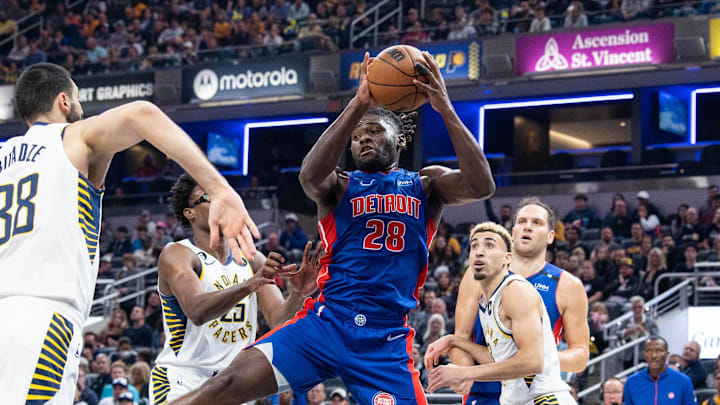 Oct 22, 2022; Indianapolis, Indiana, USA; Detroit Pistons center Isaiah Stewart (28) rebounds the ball in the first quarter against the Indiana Pacers at Gainbridge Fieldhouse. Mandatory Credit: Trevor Ruszkowski-Imagn Images