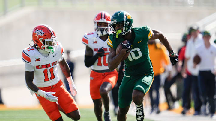 Oct 26, 2024; Waco, Texas, USA; Baylor Bears wide receiver Hal Presley (16) makes a catch against Oklahoma State Cowboys safety Dylan Smith (11) during the first half at McLane Stadium. Mandatory Credit: Chris Jones-Imagn Images Oct 26, 2024; Waco, Texas, USA; Baylor Bears wide receiver Hal Presley (16) makes a catch against Oklahoma State Cowboys safety Dylan Smith (11) during the first half at McLane Stadium. Mandatory Credit: Chris Jones-Imagn Images