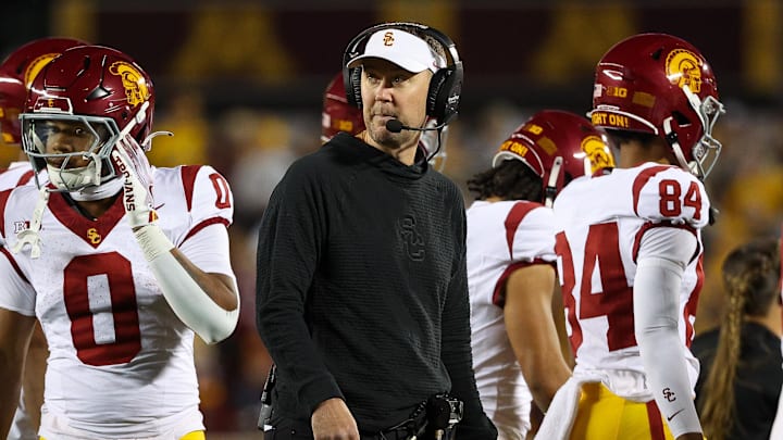Oct 5, 2024; Minneapolis, Minnesota, USA; USC Trojans head coach Lincoln Riley looks on during the first half against the Minnesota Golden Gophers at Huntington Bank Stadium. Mandatory Credit: Matt Krohn-Imagn Images