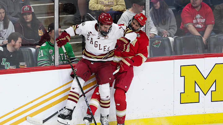 Apr 13, 2024; Saint Paul, Minnesota, USA; Boston College Eagles defenseman Aidan Hreschuk (7) checks Denver Pioneers forward Jared Wright (18) during the first period of the championship game of the 2024 Frozen Four college ice hockey tournament at Xcel Energy Center. Mandatory Credit: Matt Krohn-Imagn Images Apr 13, 2024; Saint Paul, Minnesota, USA; Boston College Eagles defenseman Aidan Hreschuk (7) checks Denver Pioneers forward Jared Wright (18) during the first period of the championship game of the 2024 Frozen Four college ice hockey tournament at Xcel Energy Center. Mandatory Credit: Matt Krohn-Imagn Images