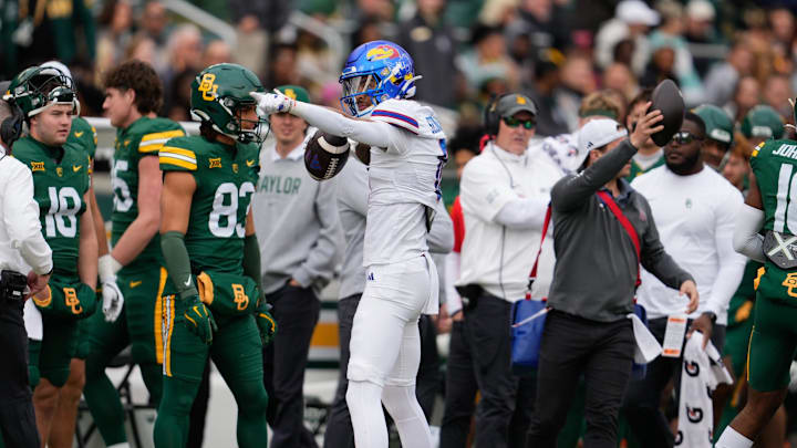 Nov 30, 2024; Waco, Texas, USA;  Kansas Jayhawks wide receiver Quentin Skinner (0) celebrates after a catch against the Baylor Bears during the first half at McLane Stadium. Mandatory Credit: Chris Jones-Imagn Images