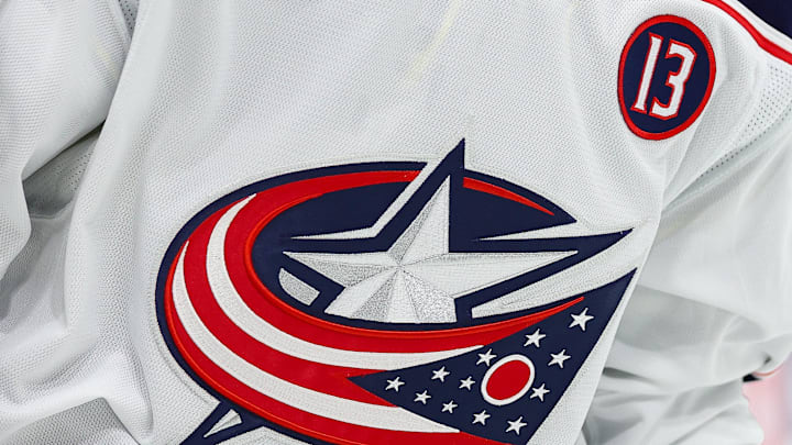 Oct 10, 2024; Saint Paul, Minnesota, USA; A patch honoring the life Johnny Gaudreau is seen on the jersey worn by Columbus Blue Jackets right wing Yegor Chinakhov (59) during the first period at Xcel Energy Center. Mandatory Credit: Matt Krohn-Imagn Images
