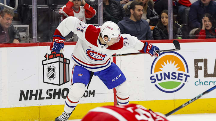 Dec 20, 2024; Detroit, Michigan, USA; Montreal Canadiens center Jake Evans (71) celebrates after scoring a goal in the first period against the Detroit Red Wings at Little Caesars Arena. Mandatory Credit: Brian Bradshaw Sevald-Imagn Images
