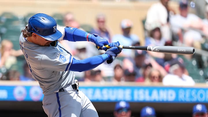 May 30, 2024; Minneapolis, Minnesota, USA; Kansas City Royals Bobby Witt Jr. (7) hits an RBI double against the Minnesota Twins during the third inning at Target Field. Mandatory Credit: Matt Krohn-USA TODAY Sports