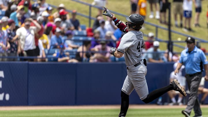 May 25, 2024; Hoover, AL, USA; South Carolina Gamecocks catcher Dalton Reeves (44) celebrates his three run hone run in the third inning against the LSU Tigers during the SEC Baseball Tournament at Hoover Metropolitan Stadium. Mandatory Credit: Vasha Hunt-Imagn Images