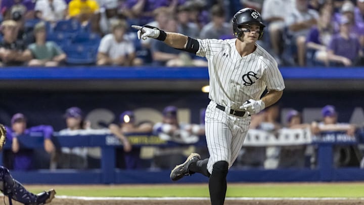 May 23, 2024; Hoover, AL, USA; South Carolina Gamecocks outfielder Blake Jackson (6) salutes his team after earning a walk against the LSU Tigers during the SEC Baseball Tournament at Hoover Metropolitan Stadium. Mandatory Credit: Vasha Hunt-Imagn Images