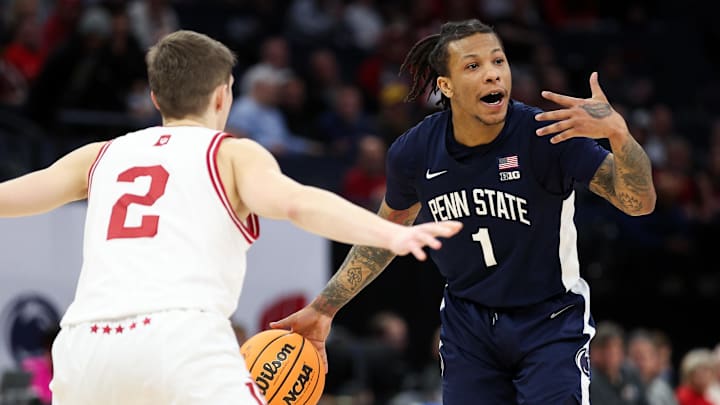 Penn State Nittany Lions guard Ace Baldwin Jr. (1) calls a play as Indiana Hoosiers guard Gabe Cupps (2) defends during the second half at Target Center.