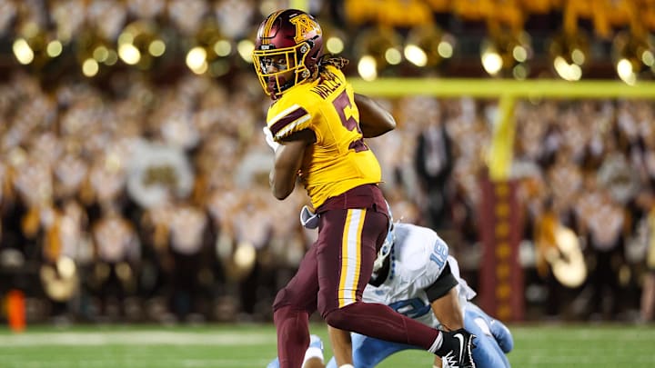 Minnesota Golden Gophers defensive back Justin Walley (5) intercepts a pass intended for North Carolina Tar Heels tight end Bryson Nesbit (18) during the first half at Huntington Bank Stadium. Minnesota Golden Gophers defensive back Justin Walley (5) intercepts a pass intended for North Carolina Tar Heels tight end Bryson Nesbit (18) during the first half at Huntington Bank Stadium.