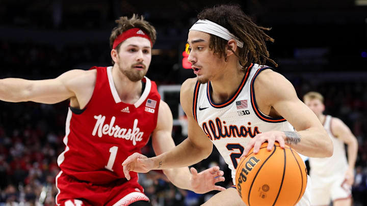 Mar 16, 2024; Minneapolis, MN, USA; Illinois Fighting Illini guard Dra Gibbs-Lawhorn (2) works around Nebraska Cornhuskers guard Sam Hoiberg (1) during the first half at Target Center. Mandatory Credit: Matt Krohn-Imagn Images