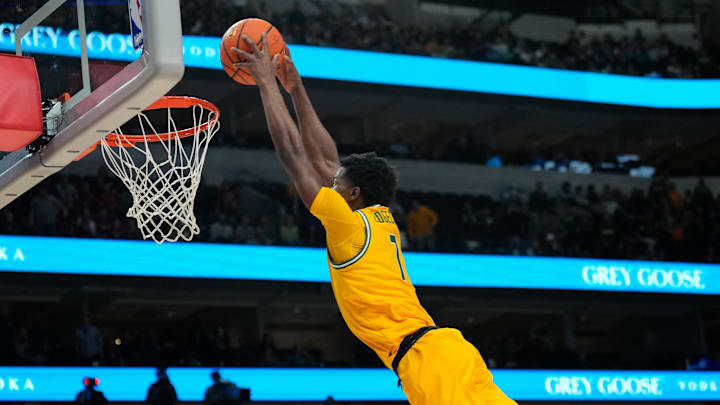 Nov 9, 2024; Dallas, Texas, USA; Baylor Bears guard VJ Edgecombe (7) dunks the ball against the Arkansas Razorbacks during the first half at American Airlines Center. Mandatory Credit: Chris Jones-Imagn Images