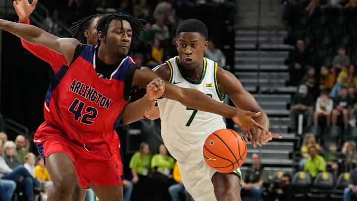 Dec 27, 2024; Waco, Texas, USA; Baylor Bears guard VJ Edgecombe (7) has the ball stolen by Arlington Baptist Patriots guard Jonathan Gray (42) during the first half at Paul and Alejandra Foster Pavilion. Mandatory Credit: Chris Jones-Imagn Images Dec 27, 2024; Waco, Texas, USA; Baylor Bears guard VJ Edgecombe (7) has the ball stolen by Arlington Baptist Patriots guard Jonathan Gray (42) during the first half at Paul and Alejandra Foster Pavilion. Mandatory Credit: Chris Jones-Imagn Images