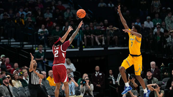Nov 9, 2024; Dallas, Texas, USA; Arkansas Razorbacks guard Boogie Fland (2) attempts a three point basket against Baylor Bears guard VJ Edgecombe (7) during the first half at American Airlines Center. Mandatory Credit: Chris Jones-Imagn Images