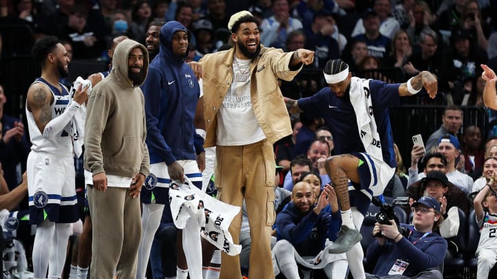 Apr 3, 2024; Minneapolis, Minnesota, USA; The Minnesota Timberwolves players on the bench celebrate Apr 3, 2024; Minneapolis, Minnesota, USA; The Minnesota Timberwolves players on the bench celebrate