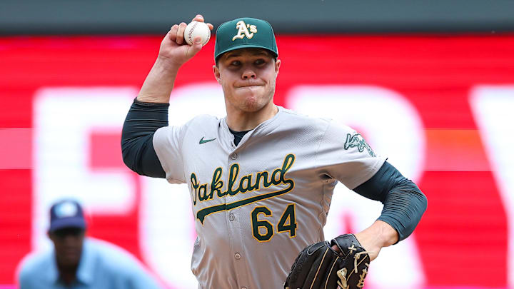 Jun 16, 2024; Minneapolis, Minnesota, USA; Oakland Athletics pitcher Vinny Nittoli (64) delivers a pitch against the Minnesota Twins during the fifth inning of game one of a double header at Target Field. Mandatory Credit: Matt Krohn-Imagn Images