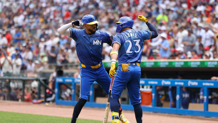Minnesota Twins shortstop Carlos Correa (4) celebrates his solo home run with designated hitter Royce Lewis (23) against the Oakland Athletics during the fourth inning of Game 1 of a doubleheader at Target Field in Minneapolis on June 16, 2024. 
