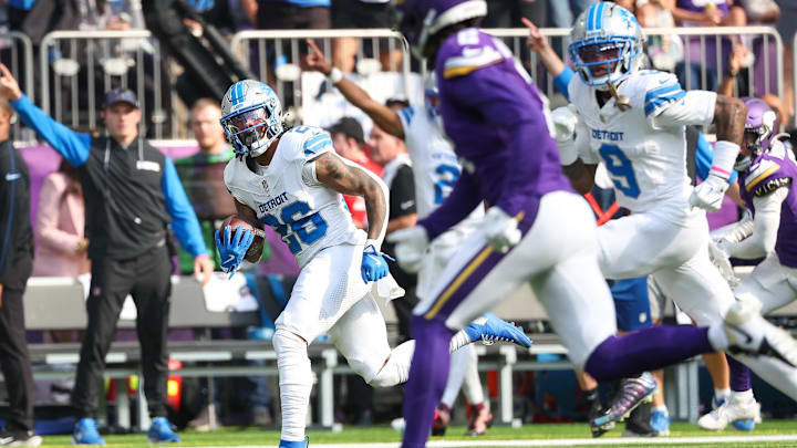 Oct 20, 2024; Minneapolis, Minnesota, USA; Detroit Lions running back Jahmyr Gibbs (26) runs the ball against the Minnesota Vikings during the second quarter at U.S. Bank Stadium. Mandatory Credit: Matt Krohn-Imagn Images