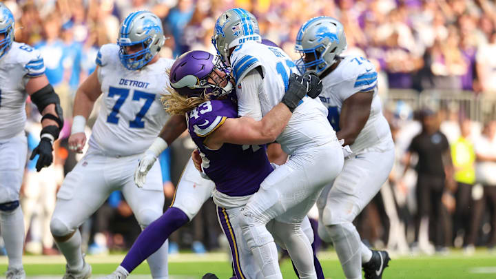 Oct 20, 2024; Minneapolis, Minnesota, USA; Minnesota Vikings linebacker Andrew Van Ginkel (43) tackles Detroit Lions quarterback Jared Goff (16) during the fourth quarter at U.S. Bank Stadium. Mandatory Credit: Matt Krohn-Imagn Images