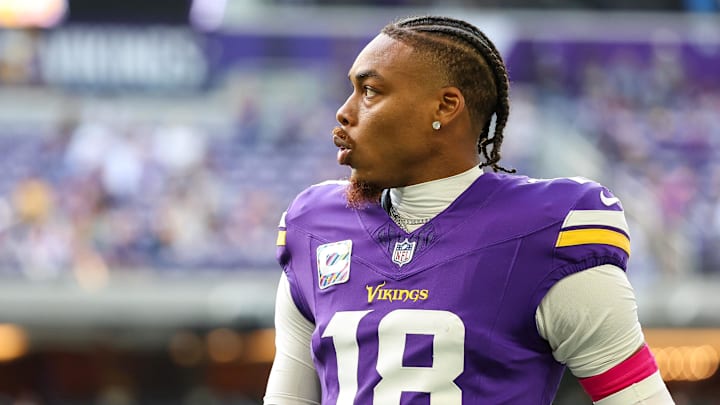 Oct 20, 2024; Minneapolis, Minnesota, USA; Minnesota Vikings wide receiver Justin Jefferson (18) warms up before the game against the Detroit Lions at U.S. Bank Stadium.