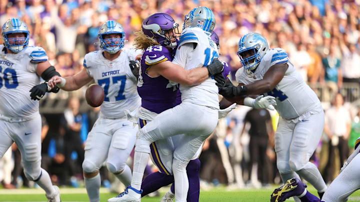 Oct 20, 2024; Minneapolis, Minnesota, USA; Minnesota Vikings linebacker Andrew Van Ginkel (43) tackles Detroit Lions quarterback Jared Goff (16) during the fourth quarter at U.S. Bank Stadium. Mandatory Credit: Matt Krohn-Imagn Images