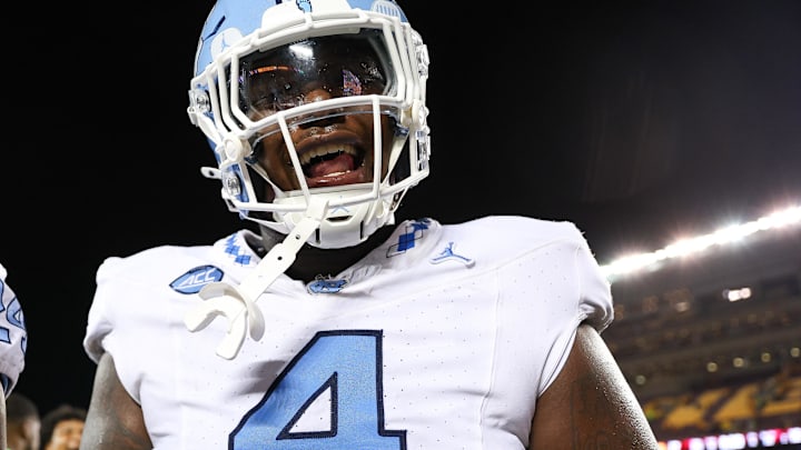 Aug 29, 2024; Minneapolis, Minnesota, USA; North Carolina Tar Heels defensive lineman Travis Shaw (4) celebrate his teams win against the Minnesota Golden Gophers after the game at Huntington Bank Stadium. Mandatory Credit: Matt Krohn-Imagn Images