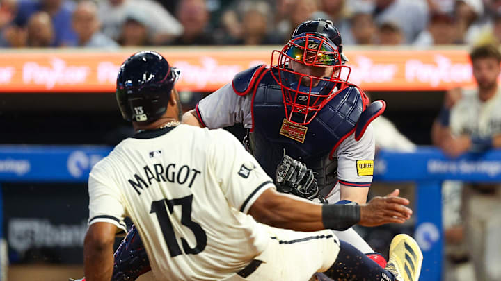 Atlanta Braves catcher Sean Murphy (12) tags out Minnesota Twins left fielder Manuel Margot (13) at home plate during the sixth inning at Target Field in 2024. Atlanta Braves catcher Sean Murphy (12) tags out Minnesota Twins left fielder Manuel Margot (13) at home plate during the sixth inning at Target Field in 2024.