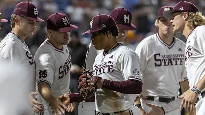 Mississippi State Bulldogs welcome in pitcher Jurrangelo Cijntje (50) after a half inning on the mound against the Vanderbilt Commodores during the SEC Baseball Tournament at Hoover Metropolitan Stadium on May 23, 2024.