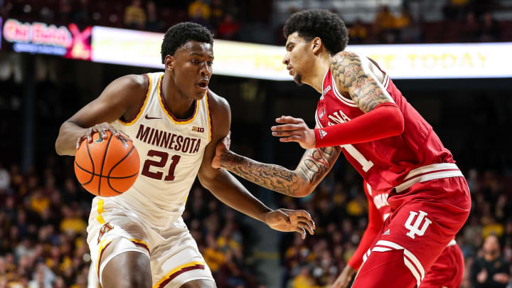 Mar 6, 2024; Minneapolis, Minnesota, USA; Minnesota Golden Gophers forward Pharrel Payne (21) against Indiana's Kel'el Ware. Mar 6, 2024; Minneapolis, Minnesota, USA; Minnesota Golden Gophers forward Pharrel Payne (21) against Indiana's Kel'el Ware.