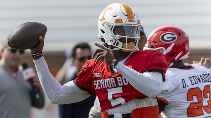 Feb 1, 2024; Mobile, AL, USA; American quarterback Joe Milton III of Tennessee (5) throws the ball during practice for the American team at Hancock Whitney Stadium. Mandatory Credit: Vasha Hunt-Imagn Images