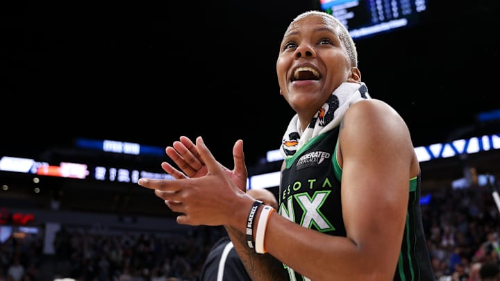 Oct 8, 2024; Minneapolis, Minnesota, USA; Minnesota Lynx guard Courtney Williams (10) celebrates their teams win after game five of the 2024 WNBA playoffs against the Connecticut Sun at Target Center. Mandatory Credit: Matt Krohn-Imagn Images