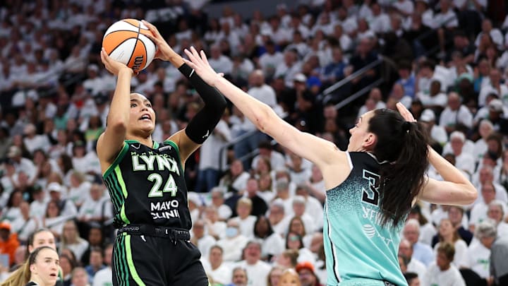 Oct 16, 2024; Minneapolis, Minnesota, USA; Minnesota Lynx forward Napheesa Collier (24) shoots as New York Liberty forward Breanna Stewart (30) defends during the first half of game three of the 2024 WNBA Finals at Target Center. Mandatory Credit: Matt Krohn-Imagn Images Oct 16, 2024; Minneapolis, Minnesota, USA; Minnesota Lynx forward Napheesa Collier (24) shoots as New York Liberty forward Breanna Stewart (30) defends during the first half of game three of the 2024 WNBA Finals at Target Center. Mandatory Credit: Matt Krohn-Imagn Images