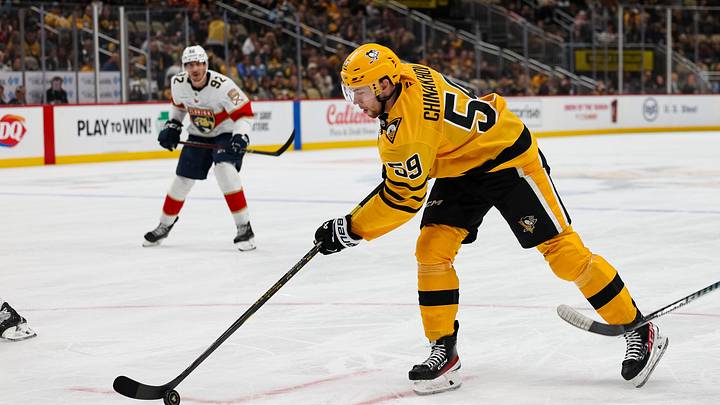 Apr 5, 2026; Pittsburgh, Pennsylvania, USA; Pittsburgh Penguins right wing Egor Chinakhov (59) controls the puck against the Florida Panthers during the third period at PPG Paints Arena. Mandatory Credit: Mark Alberti-Imagn Images