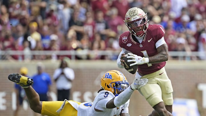Oct 11, 2025; Tallahassee, Florida, USA; Florida State Seminoles quarterback Thomas Castellanos (1) looks to throw as he is pressured by Pittsburgh Panthers linebacker Kyle Louis (9) during the first half at Doak S. Campbell Stadium. Mandatory Credit: Melina Myers-Imagn Images Oct 11, 2025; Tallahassee, Florida, USA; Florida State Seminoles quarterback Thomas Castellanos (1) looks to throw as he is pressured by Pittsburgh Panthers linebacker Kyle Louis (9) during the first half at Doak S. Campbell Stadium. Mandatory Credit: Melina Myers-Imagn Images