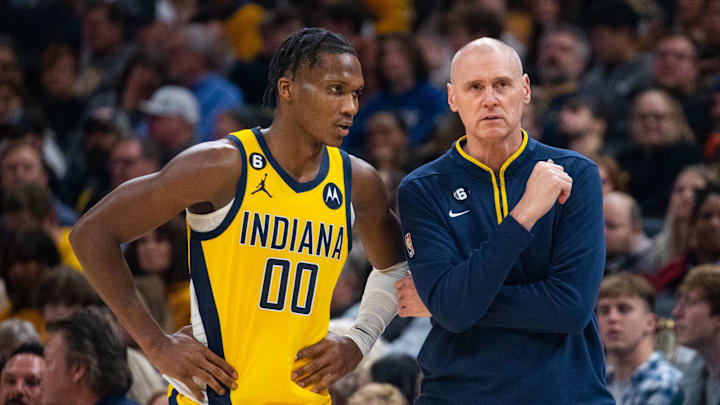 Dec 9, 2022; Indianapolis, Indiana, USA; Indiana Pacers guard Bennedict Mathurin (00) and head coach Rick Carlisle talk in the second half against the Washington Wizards at Gainbridge Fieldhouse. Mandatory Credit: Trevor Ruszkowski-Imagn Images Dec 9, 2022; Indianapolis, Indiana, USA; Indiana Pacers guard Bennedict Mathurin (00) and head coach Rick Carlisle talk in the second half against the Washington Wizards at Gainbridge Fieldhouse. Mandatory Credit: Trevor Ruszkowski-Imagn Images
