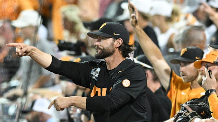 Jun 24, 2024; Omaha, NE, USA;  Tennessee Volunteers head coach Tony Vitello signals the team against the Tennessee Volunteers during the ninth inning at Charles Schwab Field Omaha. Mandatory Credit: Steven Branscombe-Imagn Images