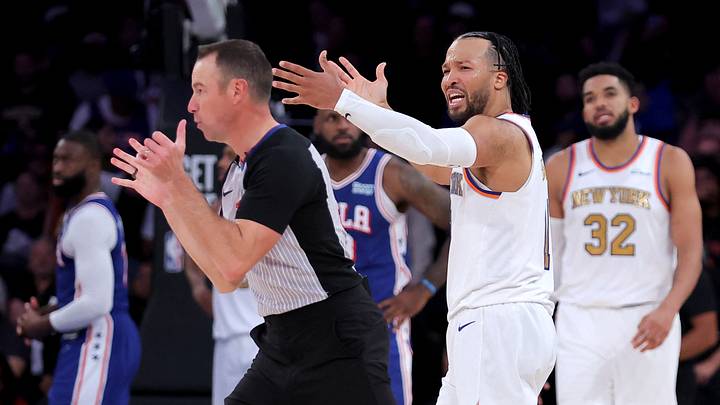 New York Knicks guard Jalen Brunson (11) reacts after a call by referee Josh Tiven (58) during the fourth quarter against the Philadelphia 76ers at Madison Square Garden. New York Knicks guard Jalen Brunson (11) reacts after a call by referee Josh Tiven (58) during the fourth quarter against the Philadelphia 76ers at Madison Square Garden.