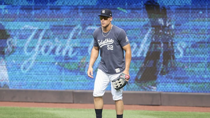 Jul 30, 2025; Bronx, New York, USA;  New York Yankees outfielder Aaron Judge (99) fields fly balls prior to the game against the Tampa Bay Rays at Yankee Stadium. Mandatory Credit: Wendell Cruz-Imagn Images