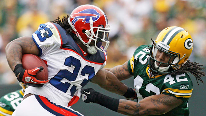 Buffalo Bills Marshawn Lynch breaks an attempted tackle by Green Bay Packers safety Morgan Burnett during the first quarter of their game Sunday, September 19, 2010 at Lambeau Field in Green Bay, Wis. The Packers won, 34-7.