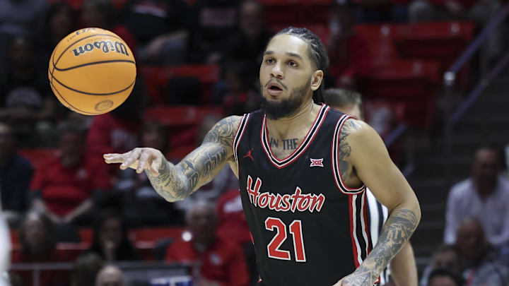 Feb 10, 2026; Salt Lake City, Utah, USA; Houston Cougars guard Emanuel Sharp (21) passes the ball against the Utah Utes during the first half at Jon M. Huntsman Center. Mandatory Credit: Rob Gray-Imagn Images Feb 10, 2026; Salt Lake City, Utah, USA; Houston Cougars guard Emanuel Sharp (21) passes the ball against the Utah Utes during the first half at Jon M. Huntsman Center. Mandatory Credit: Rob Gray-Imagn Images