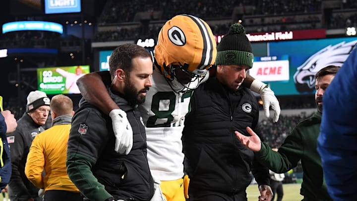 Green Bay Packers wide receiver Romeo Doubs (87) is helped off the field after being injured against the Philadelphia Eagles.