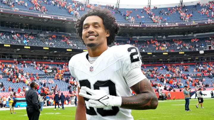 Sep 10, 2023; Denver, Colorado, USA; Las Vegas Raiders safety Isaiah Pola-Mao (20) reacts following