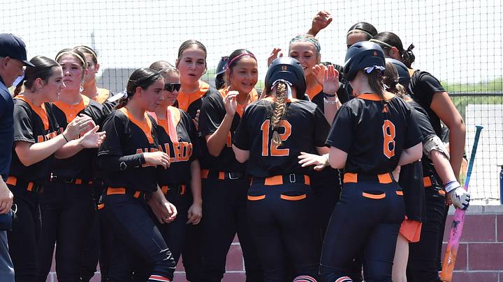 Aledo players celebrate Breleigh Mayer's home run during a playoff game against Lubbock Monterey on, Friday, May 8, 2026, at Holliday High School.