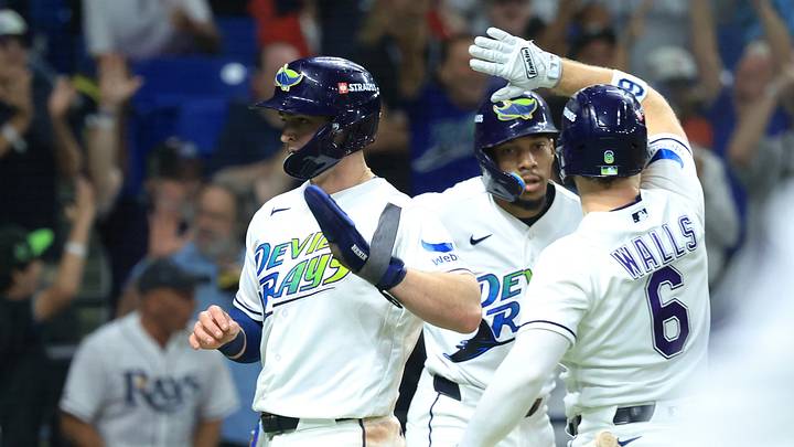 Oct 13, 2026; St. Petersburg, Florida, USA; Tampa Bay Rays second baseman Ben Williamson (15) and outfielder Chandler Simpson (14) celebrates with shortstop Taylor Walls (6) after scoring runs against the Cleveland Guardians during the fourth inning in game two of the ALCS for the 2026 MLB Playoffs at Tropicana Field. Mandatory Credit: Kim Klement Neitzel-Imagn Images Oct 13, 2026; St. Petersburg, Florida, USA; Tampa Bay Rays second baseman Ben Williamson (15) and outfielder Chandler Simpson (14) celebrates with shortstop Taylor Walls (6) after scoring runs against the Cleveland Guardians during the fourth inning in game two of the ALCS for the 2026 MLB Playoffs at Tropicana Field. Mandatory Credit: Kim Klement Neitzel-Imagn Images
