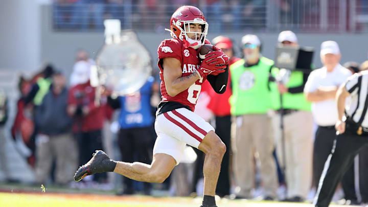 Nov 16, 2024; Fayetteville, Arkansas, USA; Arkansas Razorbacks wide receiver Isaiah Sategna (6) catches a pass during the first quarter against the Texas Longhorns at Donald W. Reynolds Razorback Stadium. Mandatory Credit: Nelson Chenault-Imagn Images
