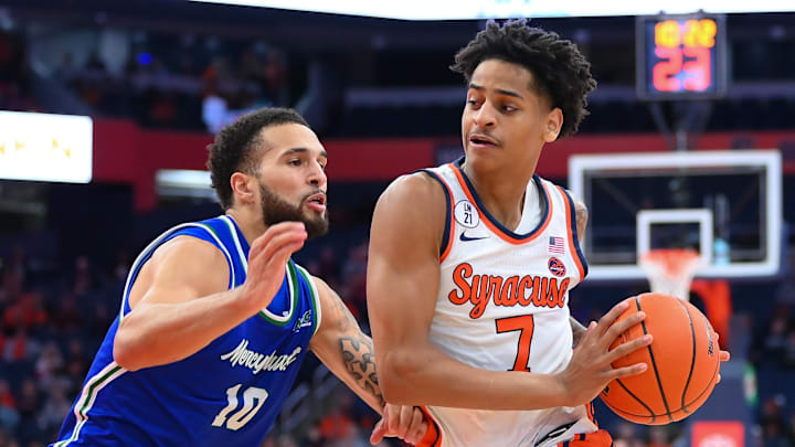 Dec 17, 2025; Syracuse, New York, USA; Syracuse Orange guard Kiyan Anthony (7) drives against Mercyhurst Lakers guard Christian Gamble (10) during the second half at the JMA Wireless Dome. Mandatory Credit: Rich Barnes-Imagn Images Dec 17, 2025; Syracuse, New York, USA; Syracuse Orange guard Kiyan Anthony (7) drives against Mercyhurst Lakers guard Christian Gamble (10) during the second half at the JMA Wireless Dome. Mandatory Credit: Rich Barnes-Imagn Images
