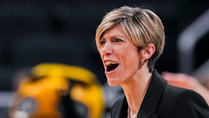 Iowa Hawkeyes head coach Jan Jensen celebrates Thursday, March 6, 2025, in a round two game at the 2025 TIAA Big Ten Women's Basketball Tournament between the Iowa Hawkeyes and the Michigan State Spartans at Gainbridge Fieldhouse in Indianapolis.