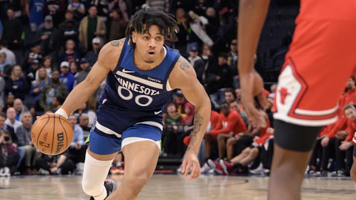 Feb 5, 2025; Minneapolis, Minnesota, USA; Minnesota Timberwolves guard Terrence Shannon Jr.  (00) controls the ball against the Chicago Bulls during the fourth quarter at Target Center. Mandatory Credit: Nick Wosika-Imagn Images